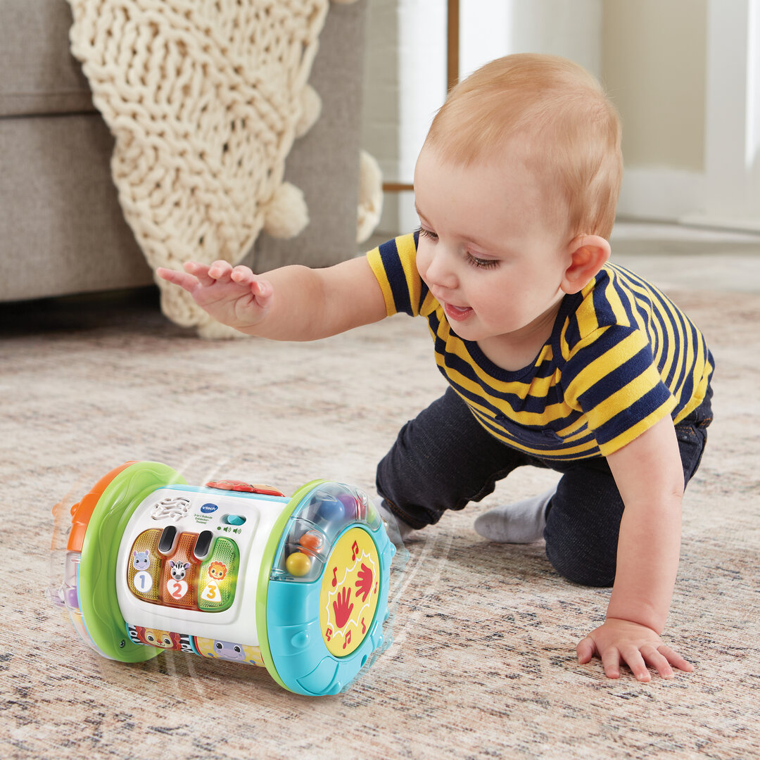 VTech 3-in-1 Rollende Entdecker-Trommel in buntem Kunststoff  13,8×18,8 cm, Rollen, Trommeln, 5 Entdeckerseiten mit Leucht-Klavier, Musik 7 Lieder, 18 Melodien, Bewegungssensor, kindersicher, ab 9 Monaten, Person, Krabbeln